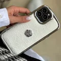 iPhone case with white embroidery design